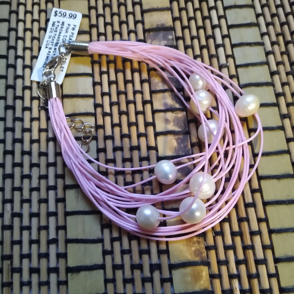 NWT Freshwater pearl bracelet with pink cord.
